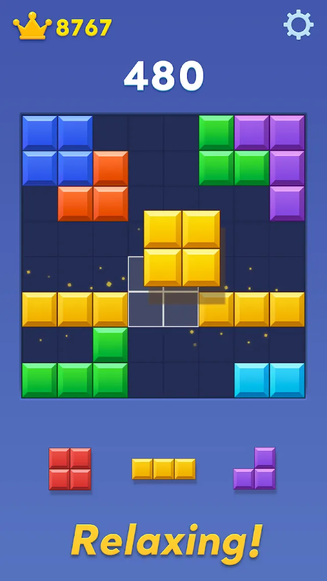 Tabuleiro 8x8 do Block Blast com três peças em espera